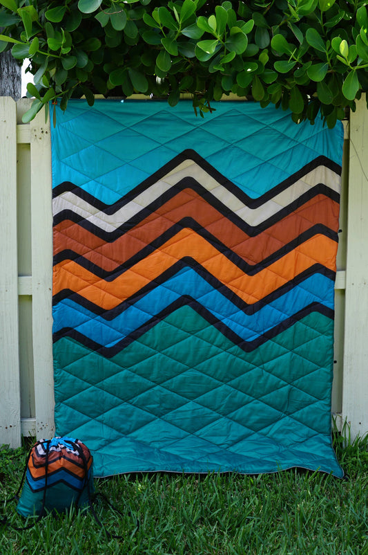 4 IN 1 PUFFER BLANKET MOUNTAINS