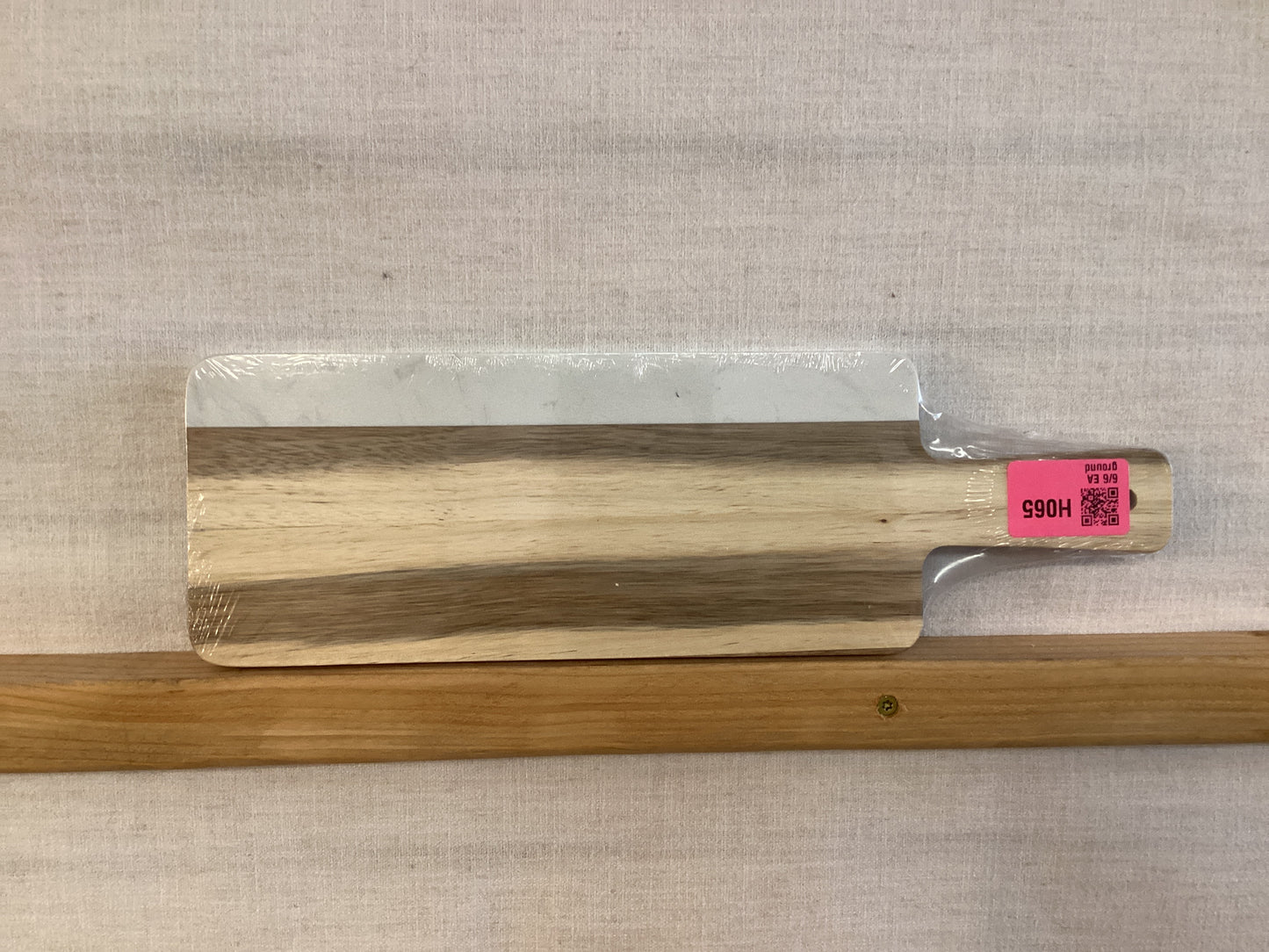White marble and acacia wood serving board
